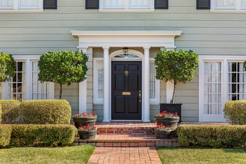 Front,Door,Of,Classic,Home,With,Landscaped,Front,Yard,And